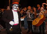 A Song and a Shot of Tequila as he entertains at a Dia de Los Muertos Celebration
