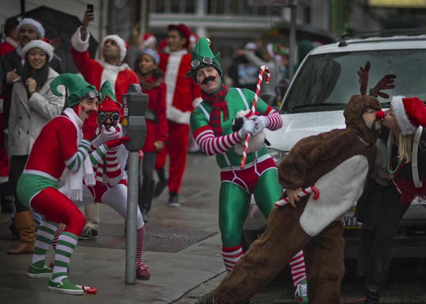 SantaCon San Francisco 2012 participants spreading cheer and goodwill