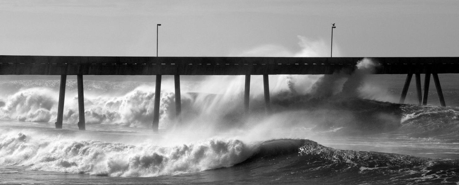 Stormy waves crash under Pacifica Pier