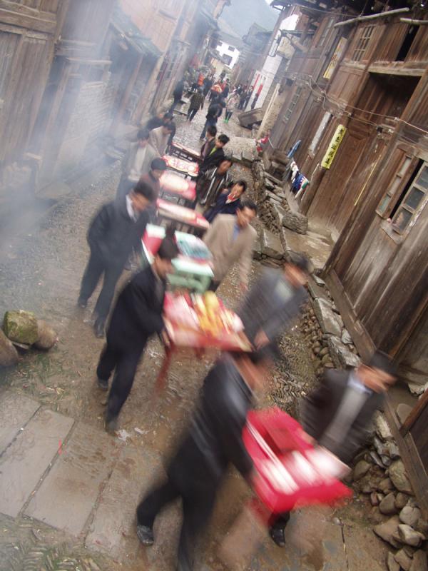 Dlivering the dowry in a wedding, Quizhou, China.
