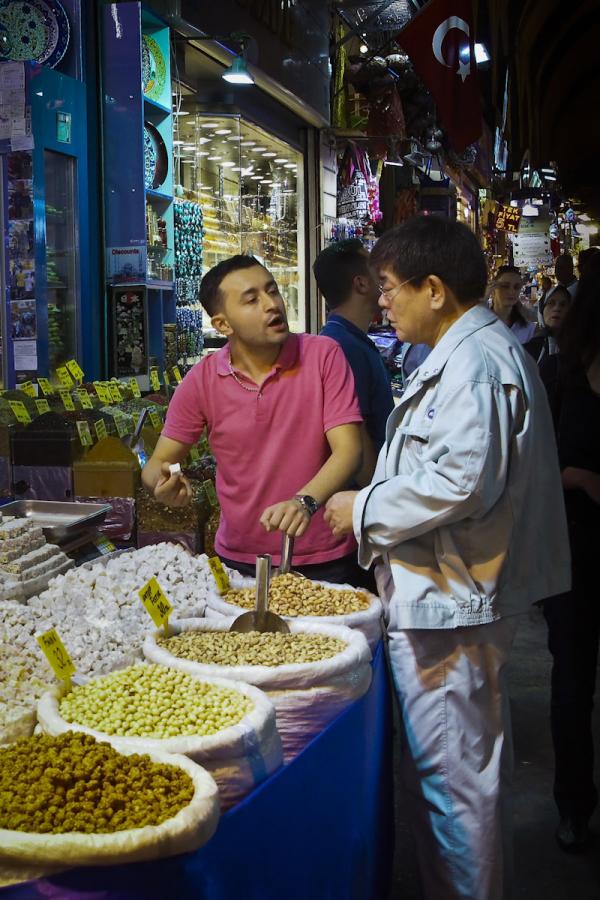 Candy Merchant Pitching His Sales at Potential Customer, Istanbul Spice Market