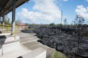 The 2014 Kilauea lava flow stops just a few feet from the transfer station in Pahoa, Hawaii.
