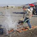 The Rule - Fastest Time with Most Water in Wheelbarrow Wins - Obviously a No Place