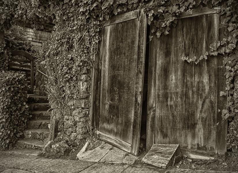 Wooden doors and winding stairs.