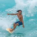 Local surfer at Sandy Beach, Hawaii