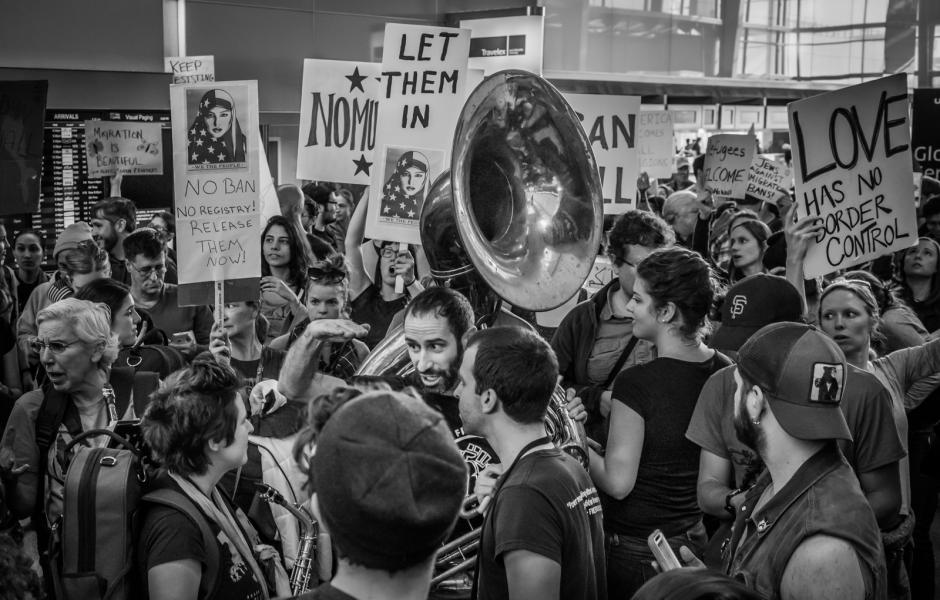 Over 1,000 protestors make noise in SFO's international terminal where several travelers were detained during President Trump's January travel ban