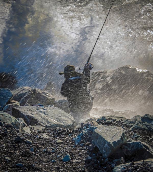 Sea Spray drenches fisherman at Mussel Rock breakwater