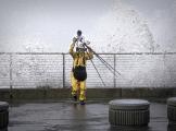 A well prepared photographer intent on capturing the large waves from a winter storm instead has to flee to protect her camera. Pacifica, January 2019