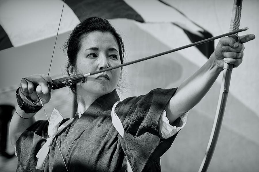 Kyudo Archeress Taking Aim.