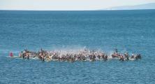 Pacifica surfers pay tribute to fallen friend Kenny Jones,  in a traditional paddle-out ceremony, 28 November 2015