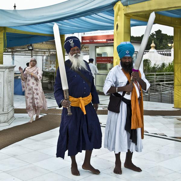 The Guardians at the Sikh Temple in Delhi.  The temple feeds over 1500 poor per day.