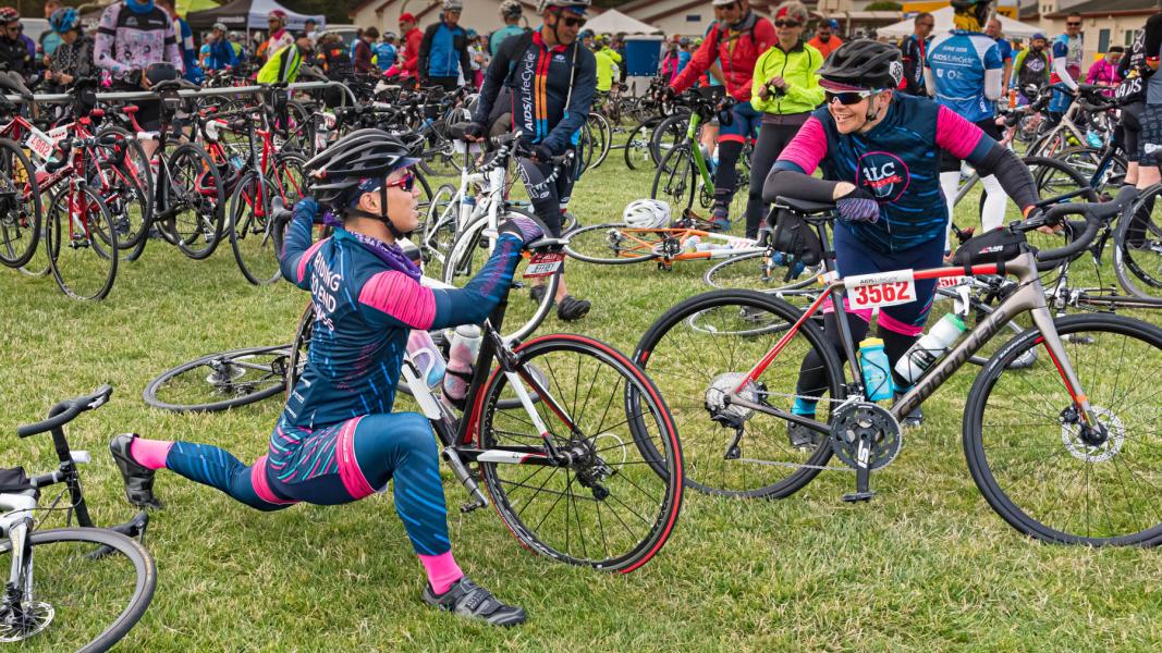 Entrant in the Aids LifeCycle Ride stays loose at the first rest stop, on their way from San Francisco to Los Angeles