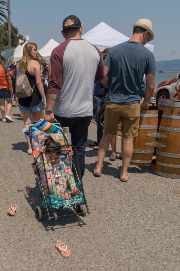 Treasure Island-flea market- Shopping cart has many uses. How did sandals get there