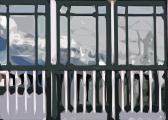 Glacier reflected in warped window, Skagway Alaska