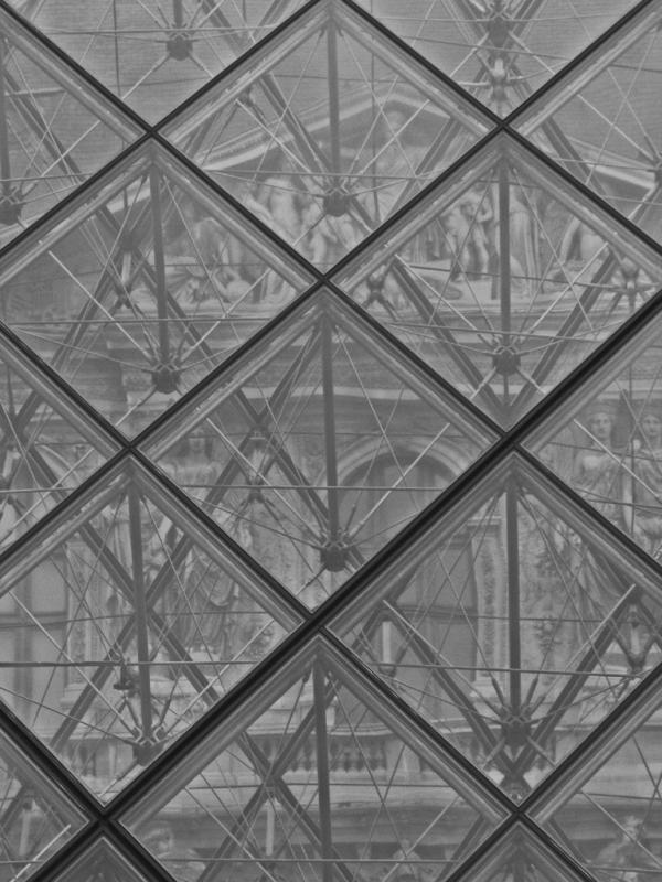 Seeing the Royal Musee du Louvre through the pyramid